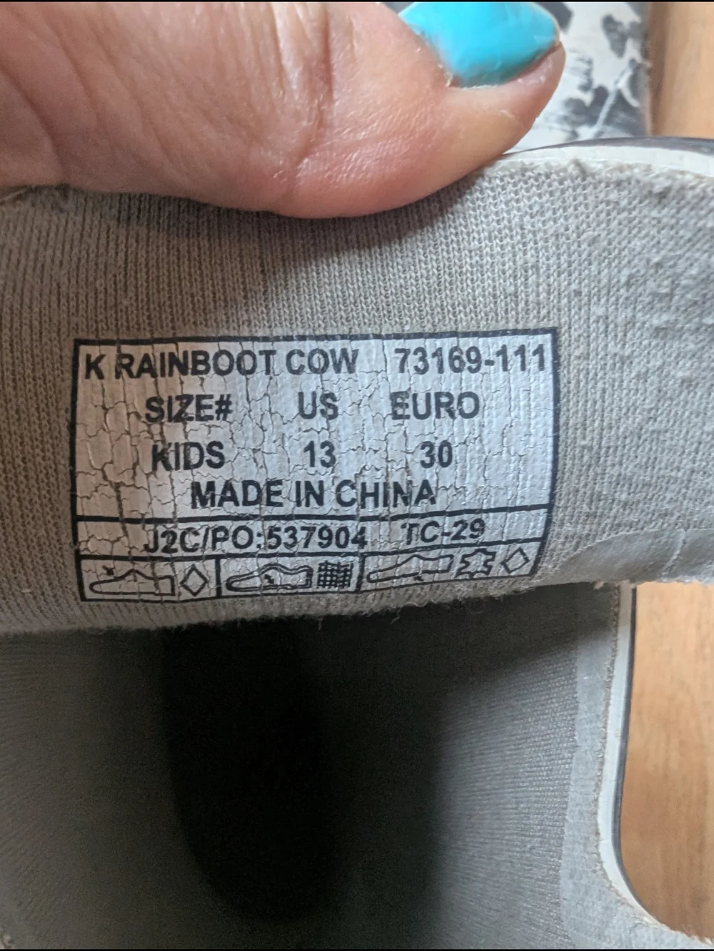 Bogs Kids Cow-Print Rain & Snow Boots in Black and White